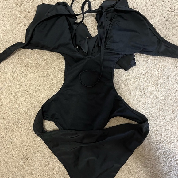 Black bathing suit with back out, never worn bc it fits more like a small - Picture 2 of 8
